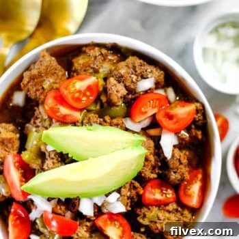 A close-up image of the keto chili with various toppings.