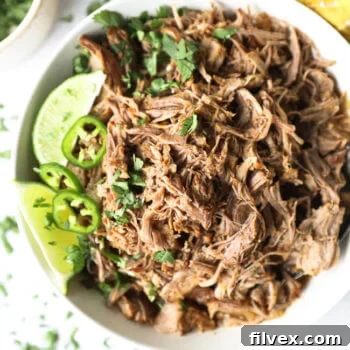 Close up overhead image of mojo pulled pork in a bowl