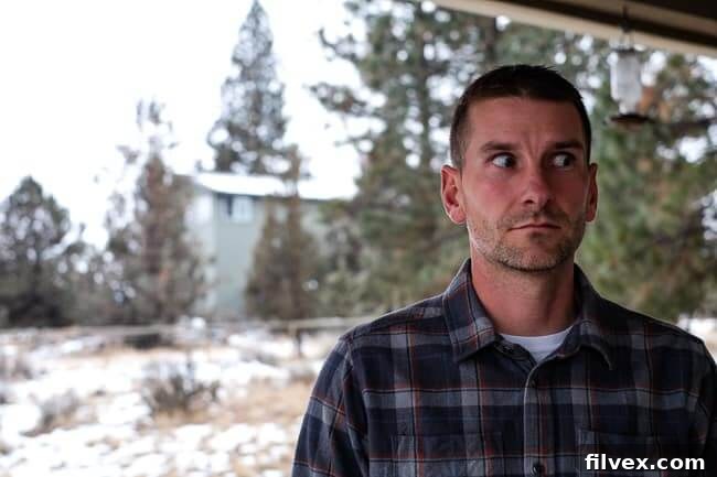 Man looking thoughtfully to the side, expressing hesitation about skipping breakfast for intermittent fasting.