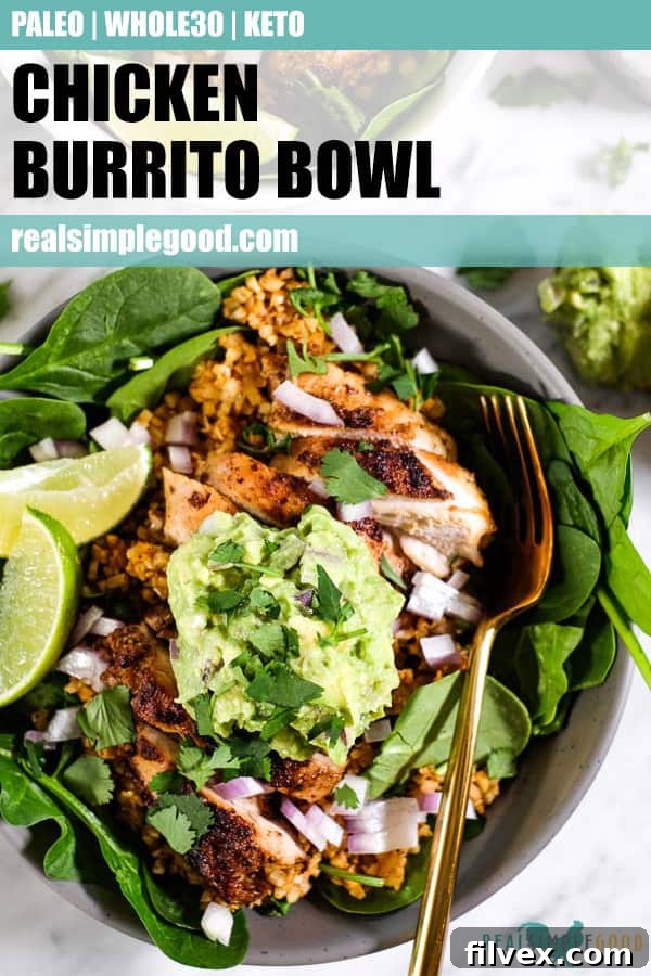 A tantalizing close-up of a chicken burrito bowl, featuring tender chicken, creamy guacamole, finely diced red onion, and fresh cilantro, perfectly composed for a long Pinterest pin.