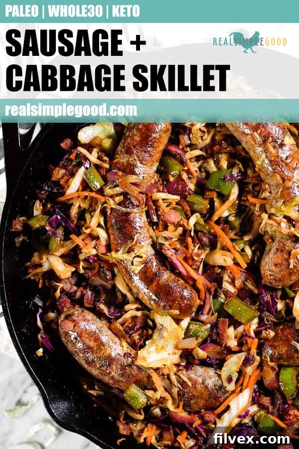 Sausage and cabbage skillet in a large cast iron skillet, close-up.