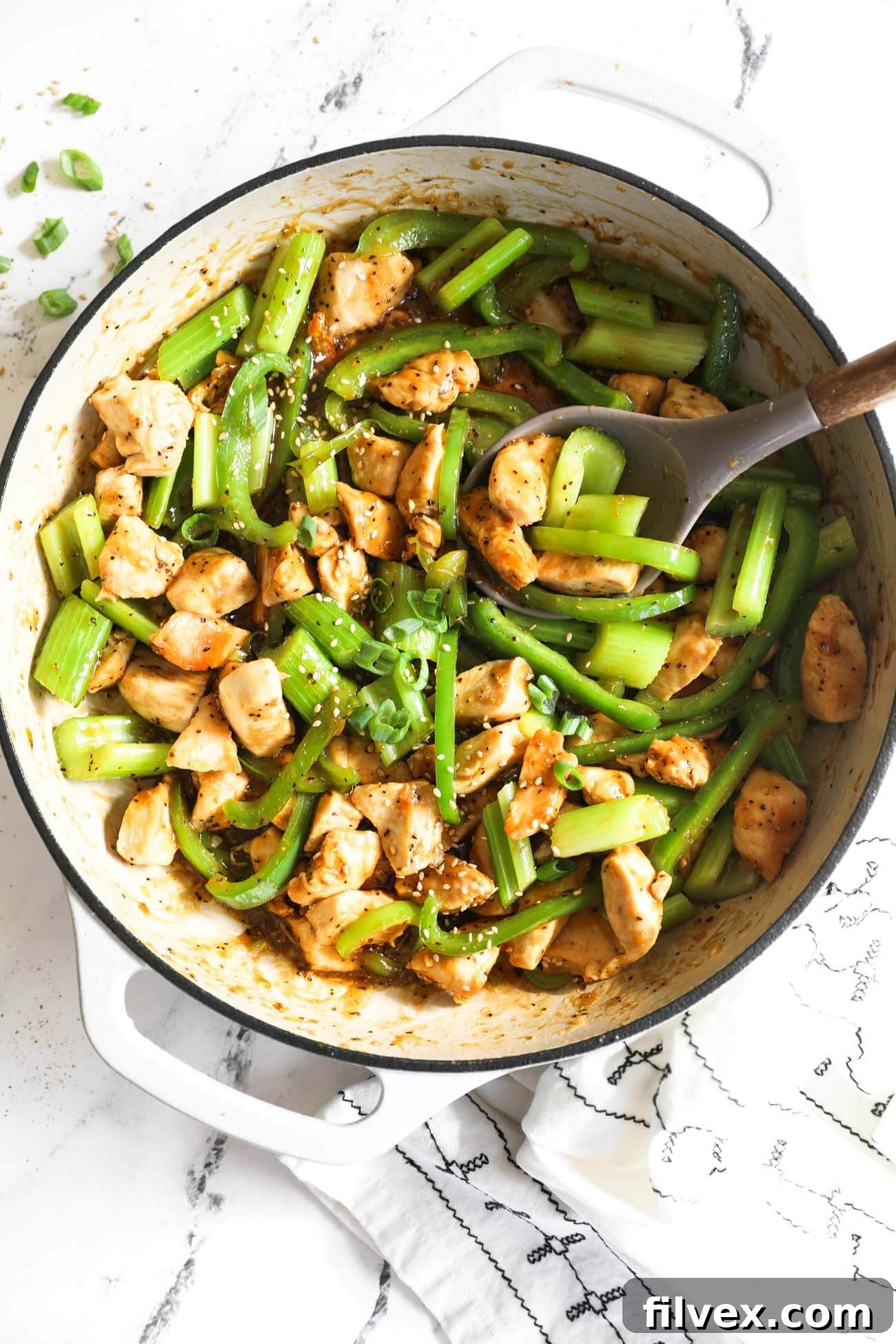Savory Black Pepper Chicken stir-fry in a pan with colorful vegetables
