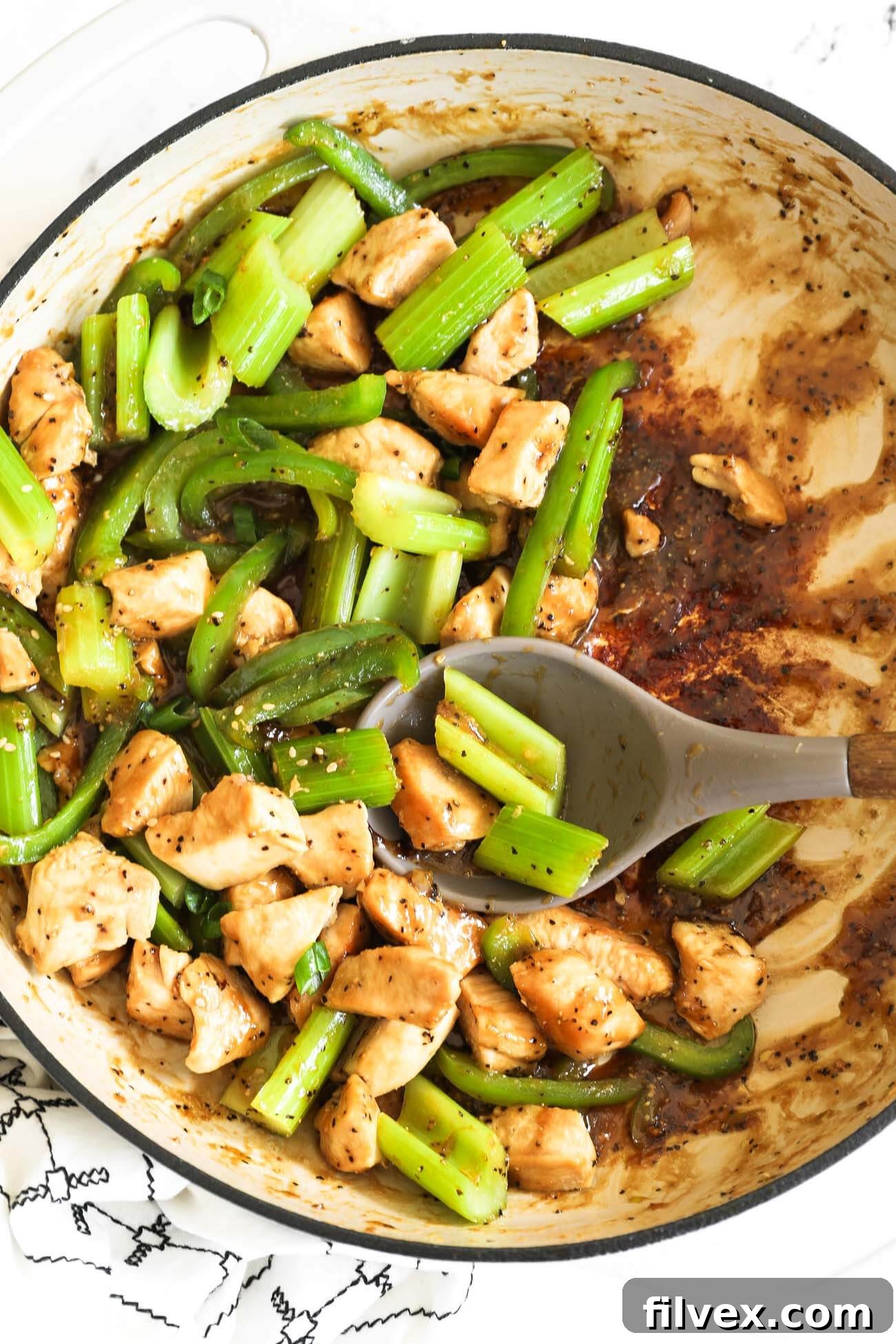 Finished black pepper chicken dish served with rice