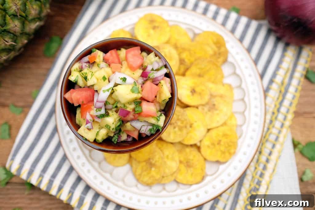 Vibrant and fresh homemade pineapple salsa in a decorative bowl, ready to be served and enjoyed.