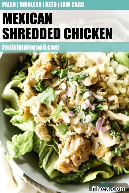 A close-up shot of Mexican shredded chicken in a bowl, served with fresh romaine lettuce, cauliflower rice, and avocado slices, all topped with chopped red onion and cilantro. The image is optimized for Pinterest with an inviting text overlay.