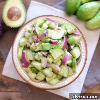 Simple Cucumber Salad featuring fresh cucumbers, red onion, and avocado