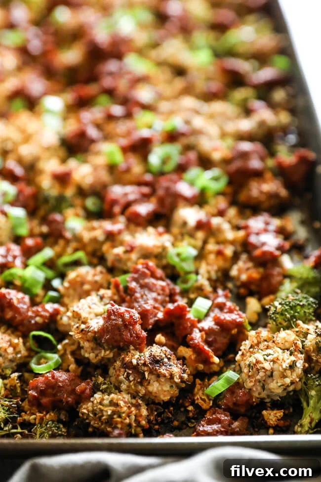 Easy chicken and chorizo bake close up at angle on sheet pan