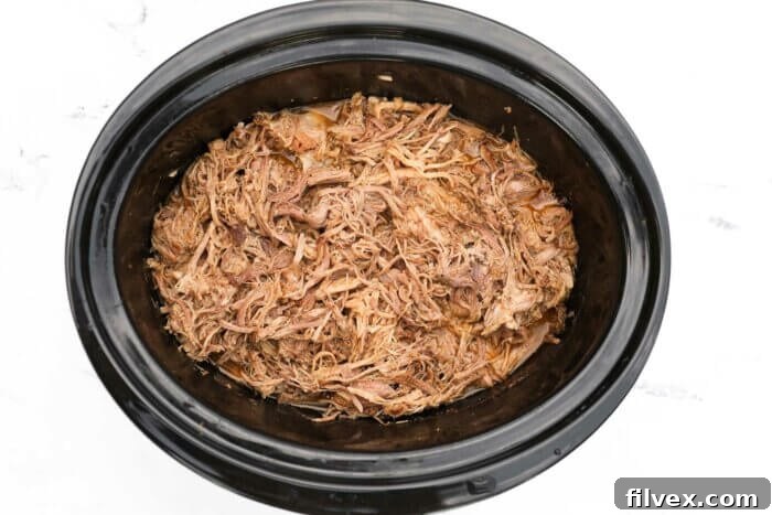 Shredded pulled pork in the slow cooker