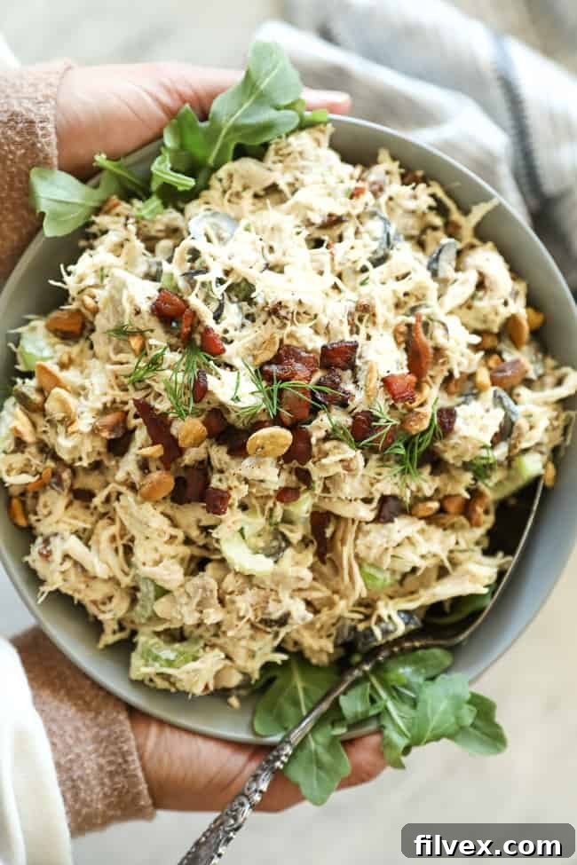 Keto chicken salad in a bowl with bacon bits