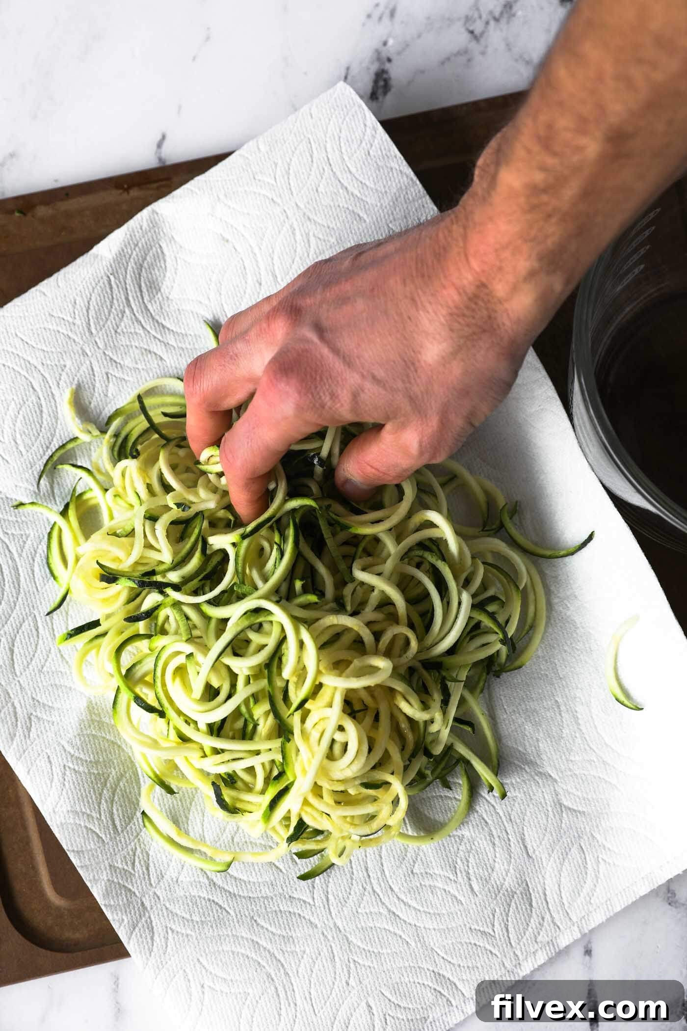 Place the noodles in a paper towel or cheesecloth.