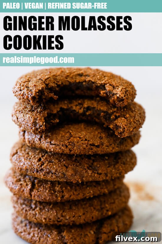 Vertical straight on image of stack of ginger molasses cookies with text overlay at top. 