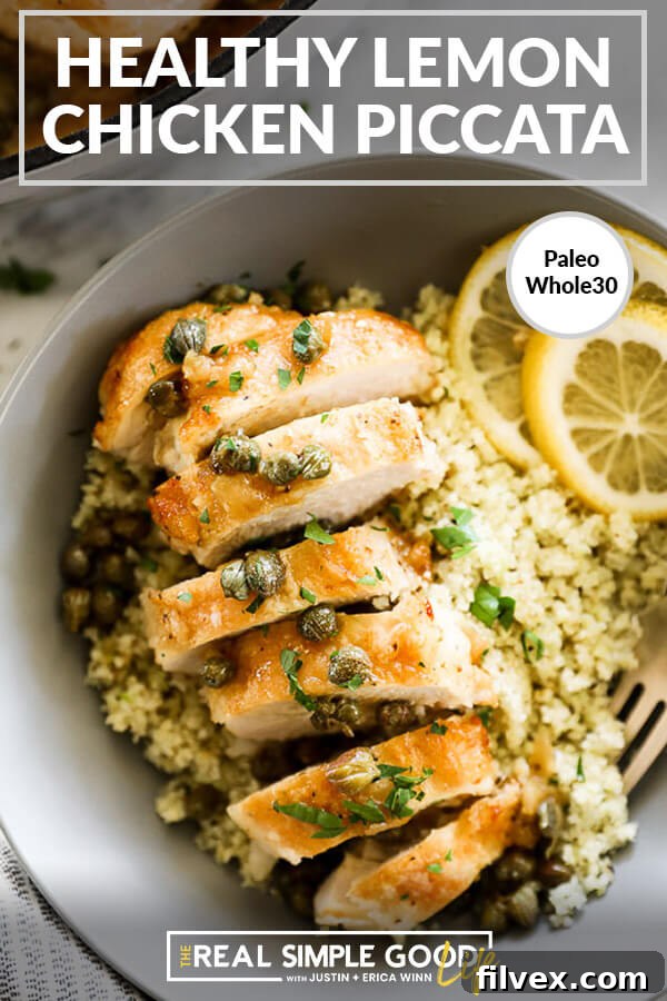 Vertical overhead close-up image of healthy Lemon Chicken Piccata served in a bowl over cauliflower rice with text overlay at top. The dish is beautifully plated and looks hearty and wholesome. This image emphasizes the healthy and satisfying nature of the meal.