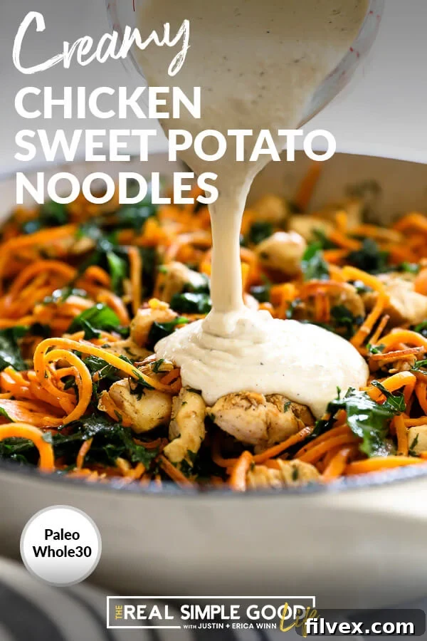 Creamy chicken sweet potato noodles in a pan with sauce being poured over, emphasizing the indulgent yet healthy aspect of this Paleo Whole30 meal.