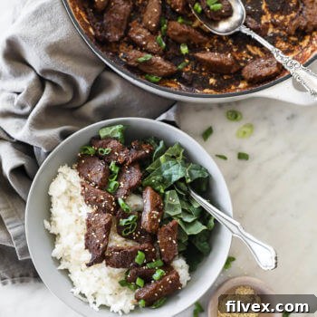Korean Beef Bulgogi in a bowl with kale and rice
