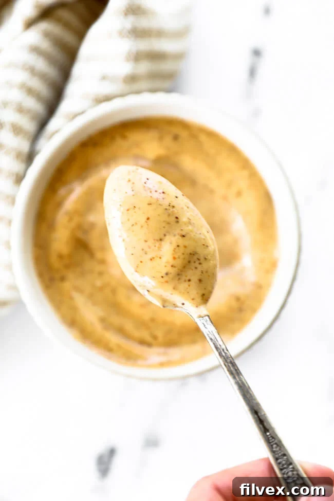 A vibrant mix of spices including chili powder and chipotle powder, essential for making a bold and flavorful homemade aioli.