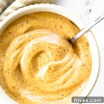 Close up overhead shot of a ramekin full of homemade chipotle aioli
