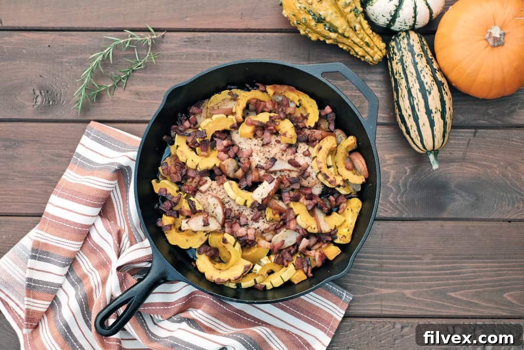 Overhead view of a cooked Pear and Squash Chicken Skillet, ready to serve
