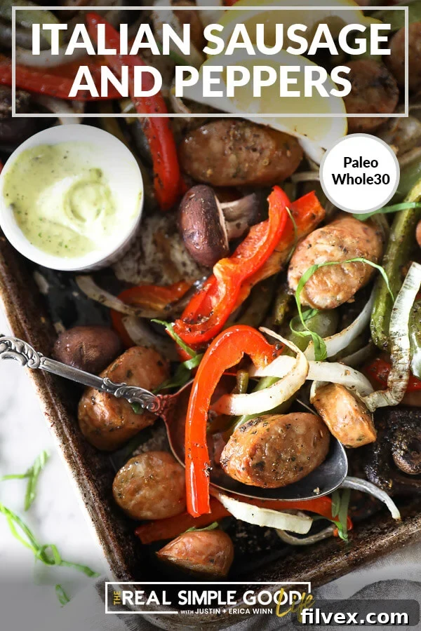 Vertical image with text overlay at the top. A close-up of beautifully roasted Italian sausage and peppers on a sheet pan, ready to be served with a metal serving spoon.