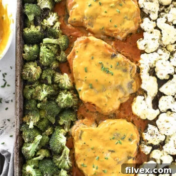 Baked Honey Mustard Pork Chops with roasted vegetables.