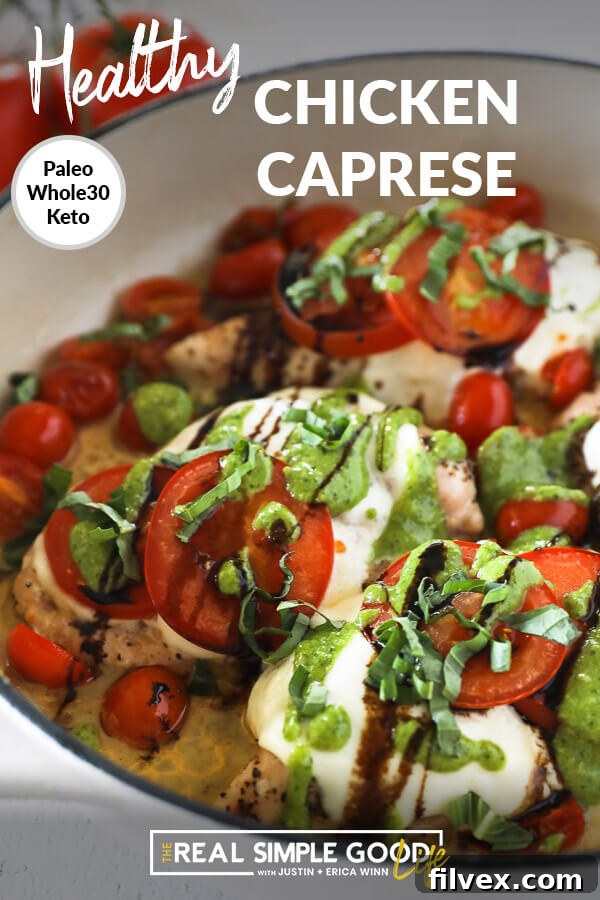 Vertical angled image of chicken caprese in skillet with text overlay at top. Chicken breasts topped with mozzarella cheese, tomatoes, pesto, balsamic and fresh basil. 