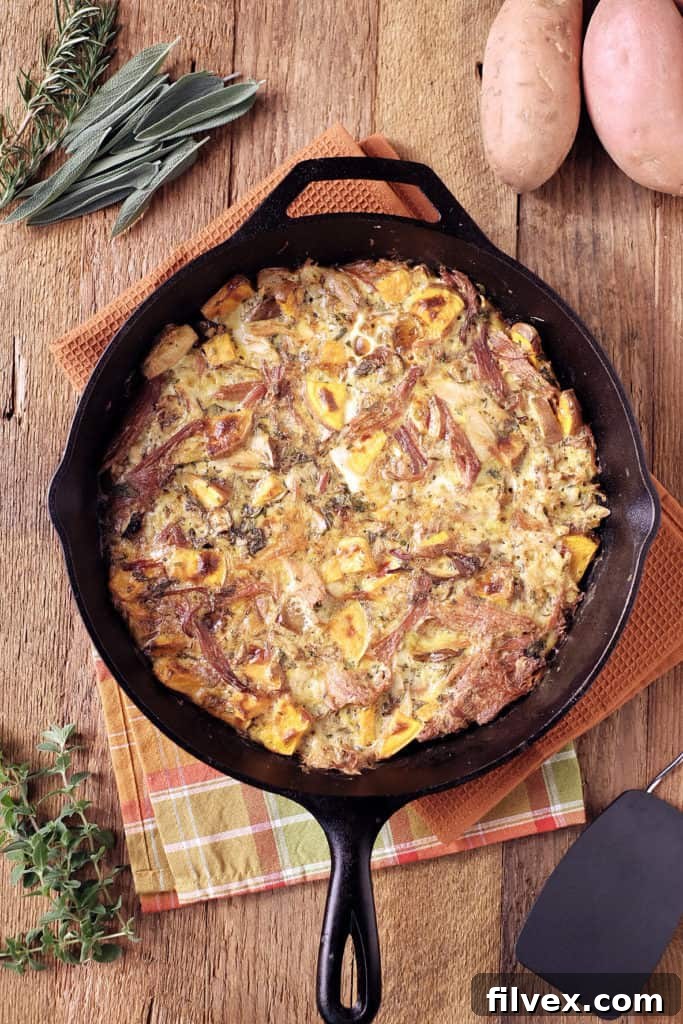 Savory Ham and Turkey Frittata, a delicious and healthy way to use Thanksgiving leftovers. Made with eggs, sweet potato, and fresh herbs, this Paleo, Whole30, and Keto-friendly breakfast is perfect for a post-holiday meal. realsimplegood.com