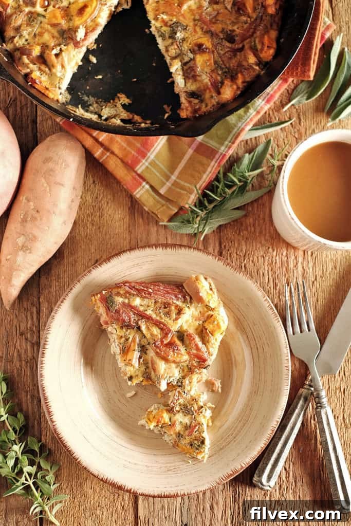 Homemade Ham and Turkey Frittata, perfect for a healthy post-Thanksgiving breakfast. This savory dish features leftover meats, sweet potato, and fresh herbs, making it Paleo, Whole30, and Keto compliant. realsimplegood.com