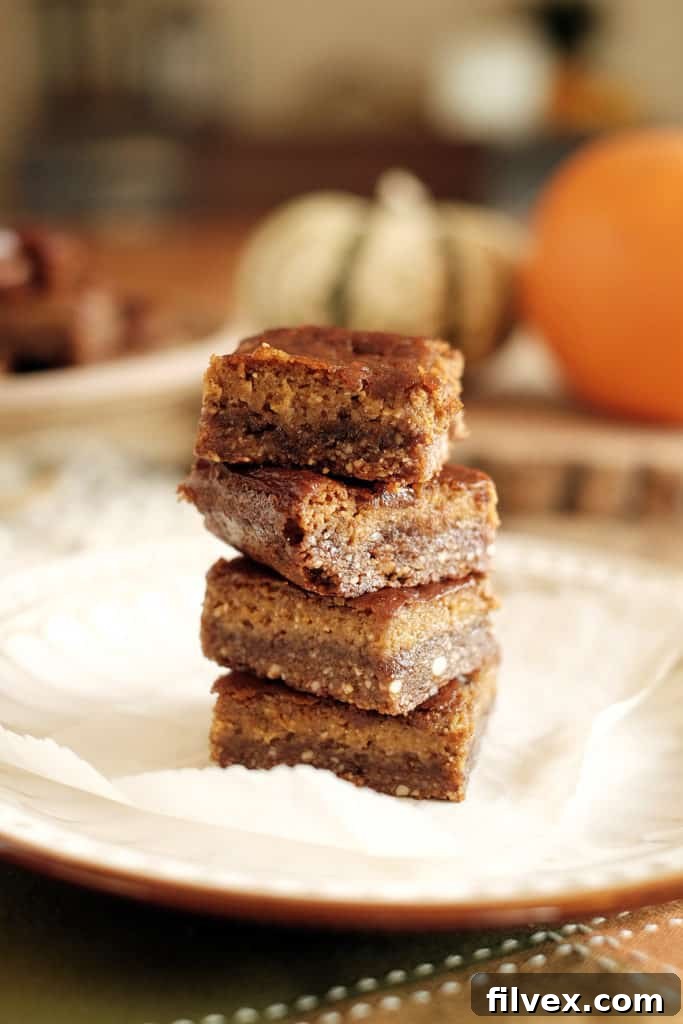 These pumpkin pie bars have a nutty and salty-sweet crust with a pumpkin pie filling. They are essentially fall all wrapped up into tasty little bars. Paleo, Gluten-Free, and Refined Sugar-Free. | realsimplegood.com