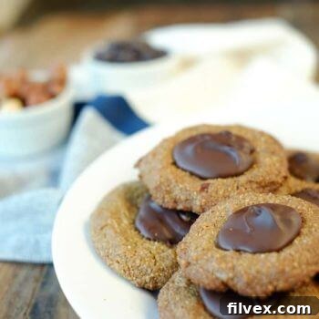 Hazelnut Thumbprint Cookies with melted chocolate centers