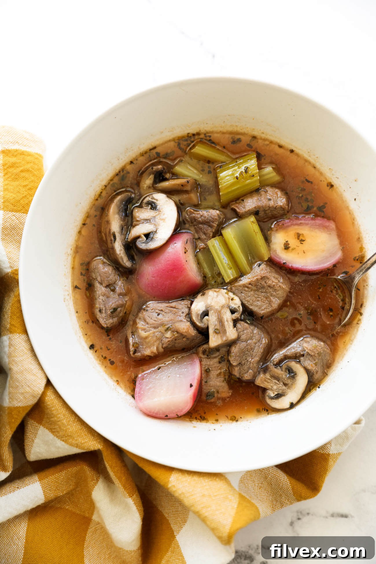 Overhead view of a hearty bowl of low-carb beef stew, perfect for a keto diet