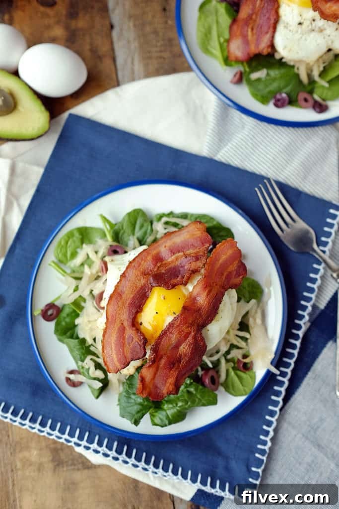 This Whole30 and Paleo breakfast burger is stacked high with delicious toppings, making it a star meal. Whole30 + Paleo. | realsimplegood.com