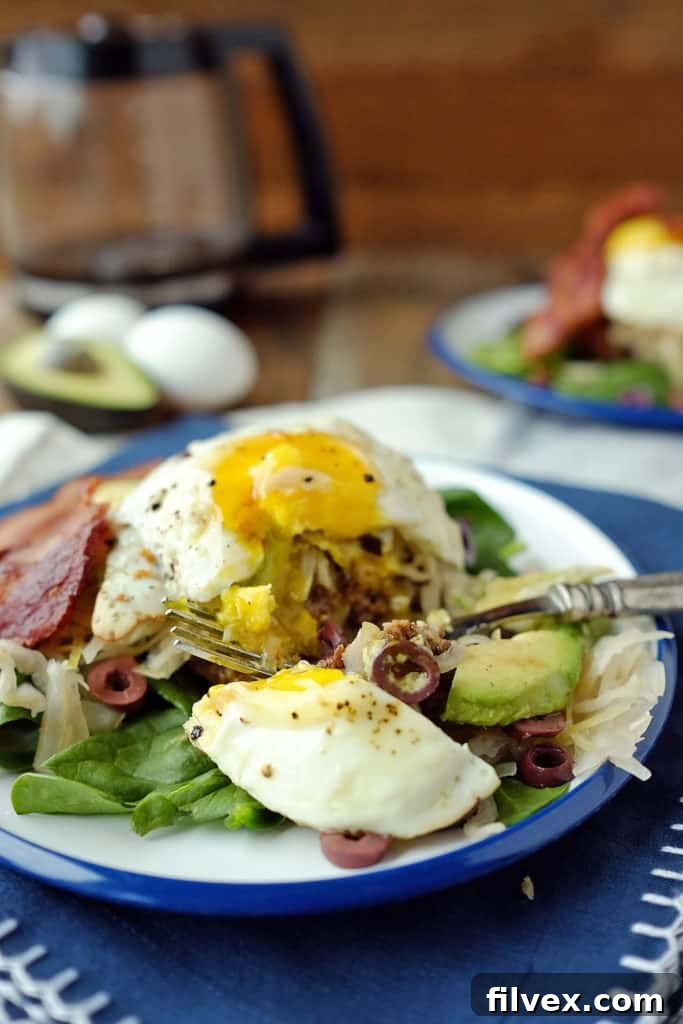 Enjoy this Whole30 and Paleo breakfast burger with all its piled-high toppings for a truly satisfying meal. Paleo + Whole30. | realsimplegood.com