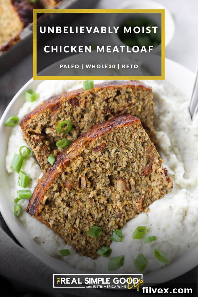 Close up overhead image of two slices of chicken meatloaf over a bowl filled with mashed potatoes