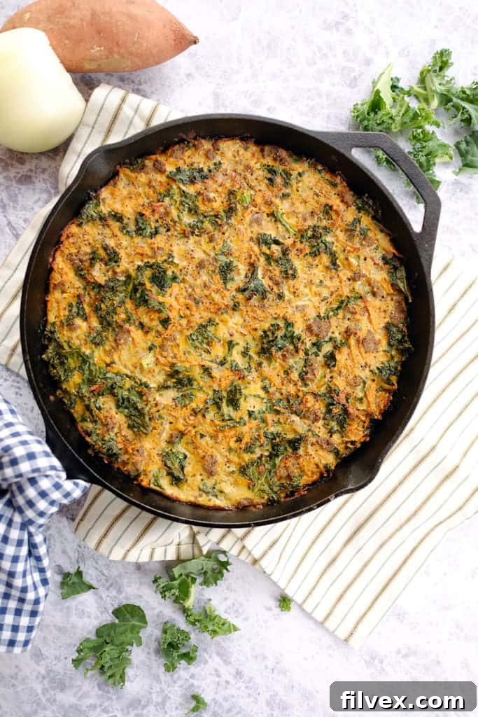 Delicious and healthy Sweet Potato Quiche, perfect for a Paleo and Whole30 breakfast or brunch. Made with eggs, sausage, kale, and sweet potatoes.