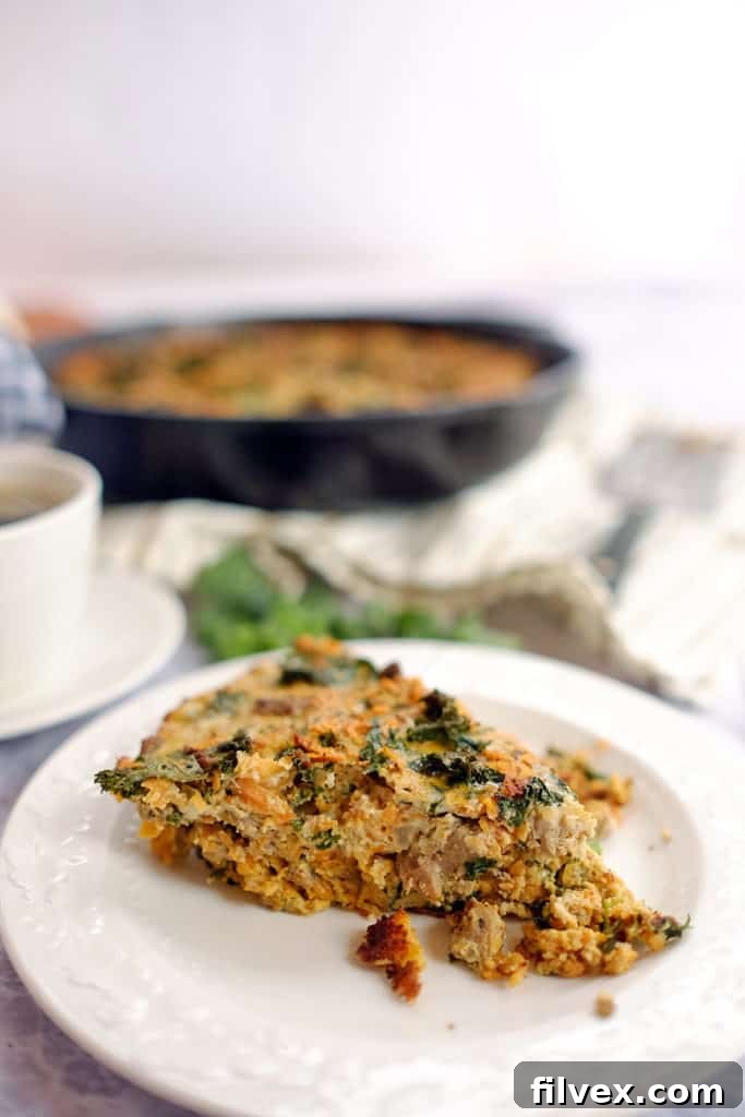 Close-up of a freshly baked sweet potato quiche, showcasing its golden crust and delicious filling.