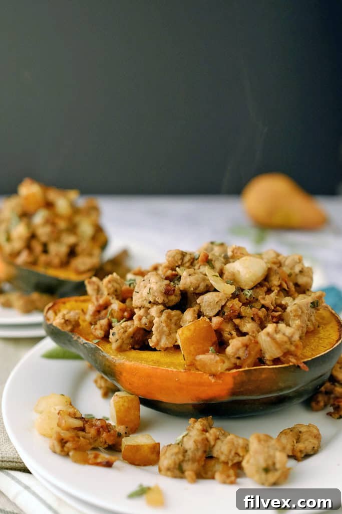 Close-up of stuffed acorn squash, highlighting the rich texture of the filling.