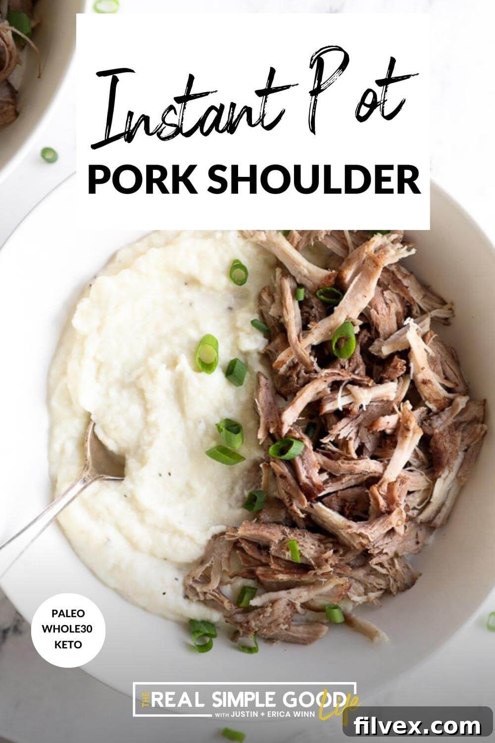 Vertical image with text overlay at the top. Image of instant pot pork shoulder served over mashed cauliflower in a bowl with chopped green onion on top. 