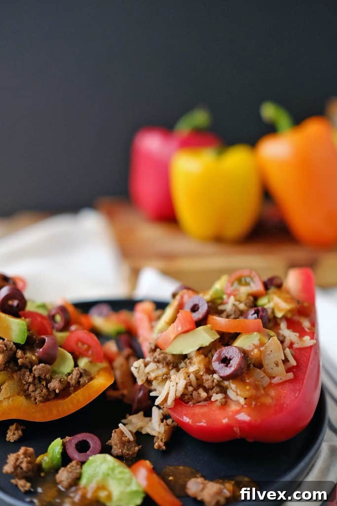 Taco Stuffed Bell Peppers freshly baked and ready to be topped, viewed from above, highlighting the delicious, well-seasoned filling.