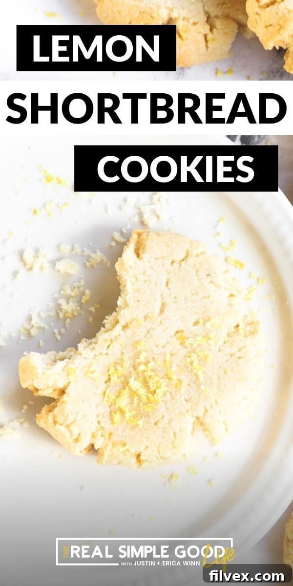 Long vertical image with text overlay at the top. Image of one lemon cookie on a plate with a bite taken out of it. Perfectly crumbly gluten-free shortbread, ready to be enjoyed with a cup of tea.