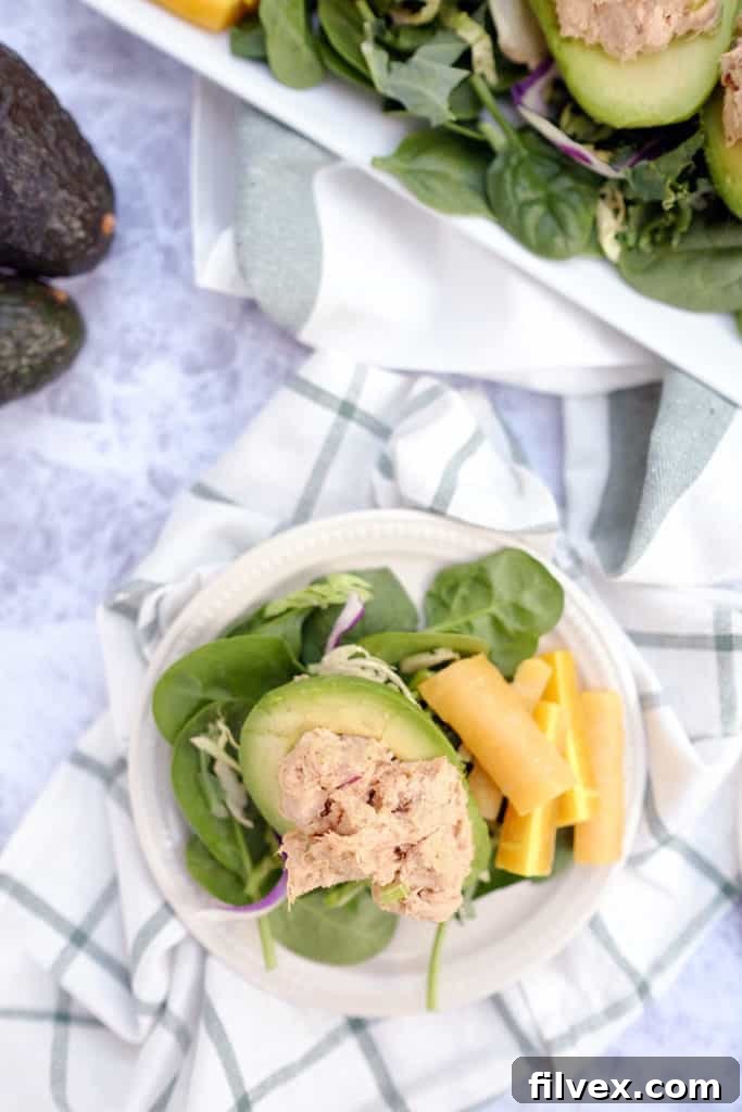 Do you struggle with lunch ideas, or are you looking for ways to up your lunch game? Here's a fresh Paleo + Whole30 idea - chicken salad stuffed avocados. Paleo, Whlole30 + Dairy-Free. | realsimplegood.com