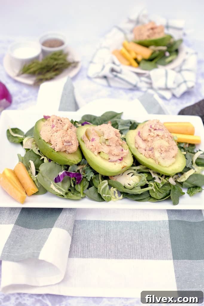Do you struggle with lunch ideas, or are you looking for ways to up your lunch game? Here's a fresh Paleo + Whole30 idea - chicken salad stuffed avocados. Paleo, Whlole30 + Dairy-Free. | realsimplegood.com