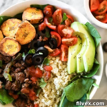 A vibrant low-carb ground beef taco salad bowl, ready to be served.
