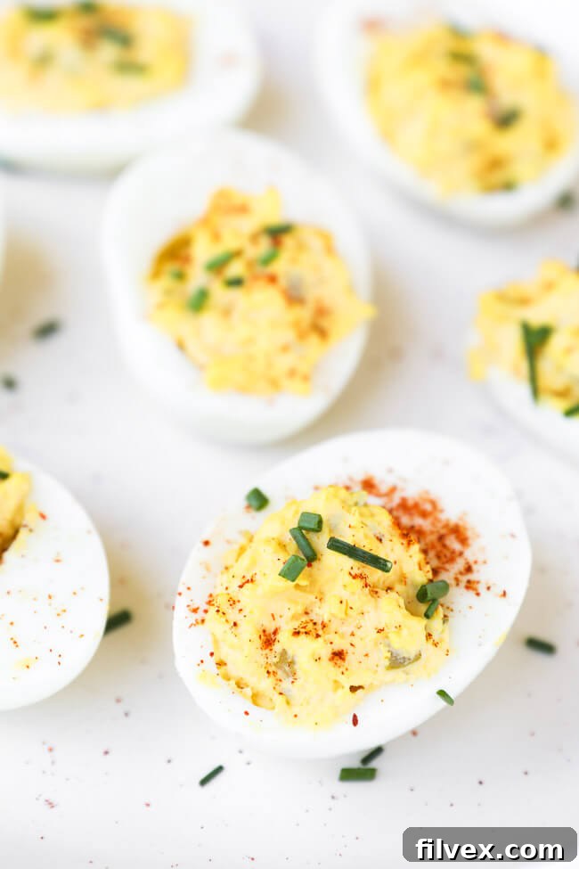 A platter of creamy keto deviled eggs, showcasing their rich texture and perfect for a low carb diet, ready for a healthy snack or appetizer.