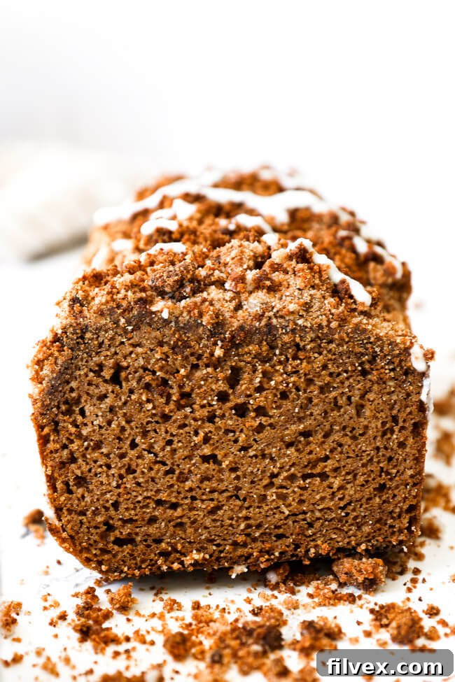 Straight on image of gluten free and dairy free pumpkin bread slice.