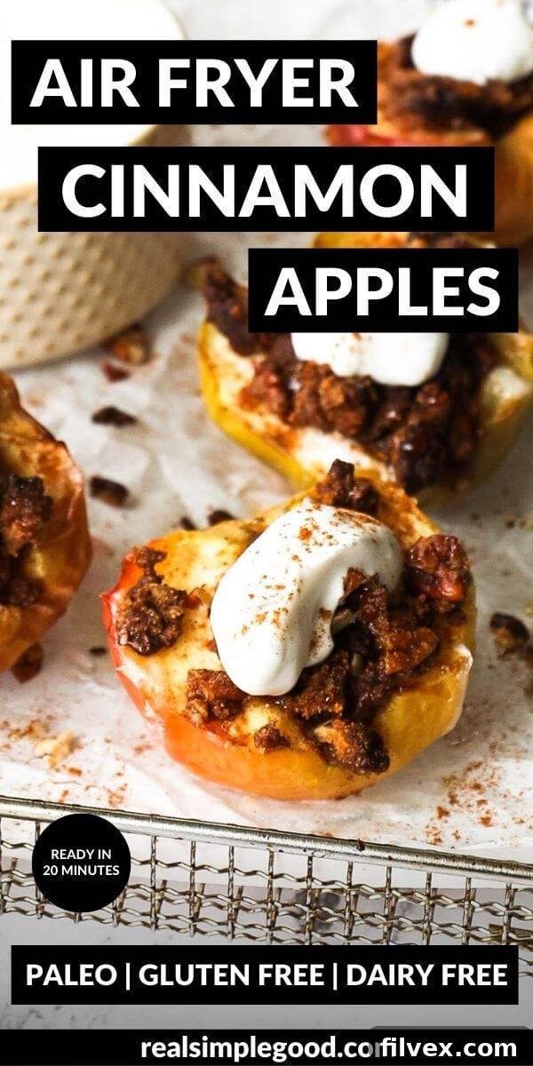 Vertical image with text overlay at the top. Image is angled close up shot of one air fryer apple stuffed with crumble topping and a dollop of coconut whipped cream on top.