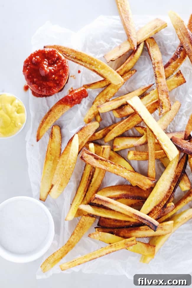 These paleo plantain fries are our cleaned-up version of an old guilty pleasure. They are sure to satisfy any cravings for fries on your Whole30 too. Whole30, Gluten-Free + Paleo. | realsimplegood.com