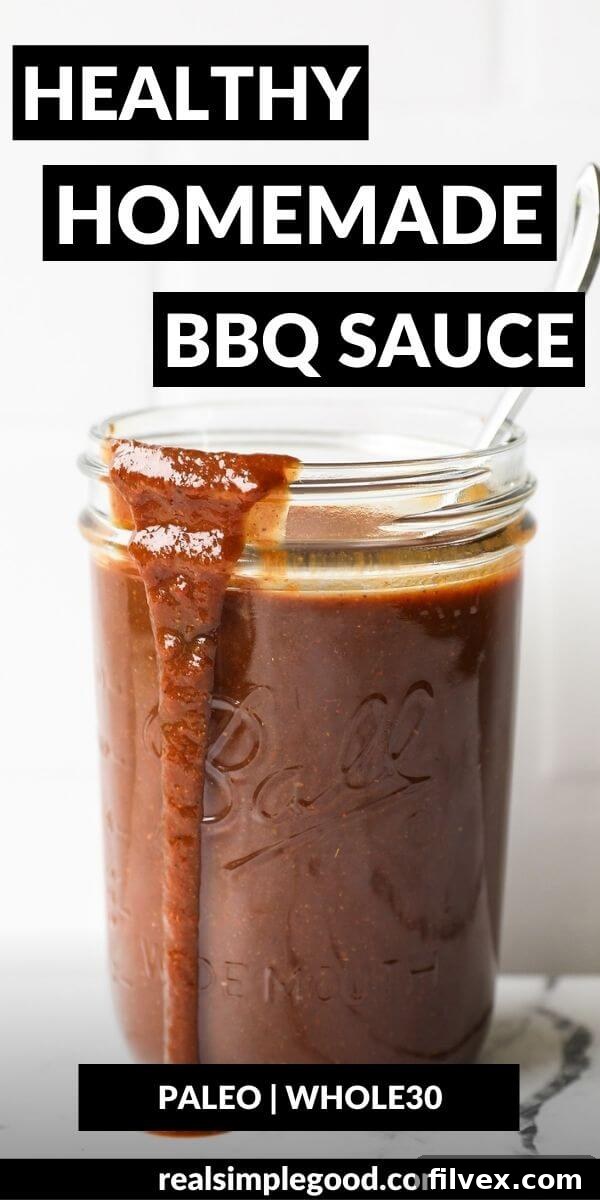 A close-up shot of grilled chicken with homemade Whole30 BBQ sauce