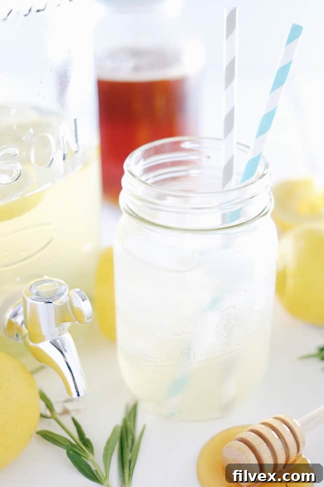 Sipping this homemade honey lavender lemonade out on your patio or porch is the perfect way to spend a summer afternoon or evening. Refined Sugar-Free. | realsimplegood.com