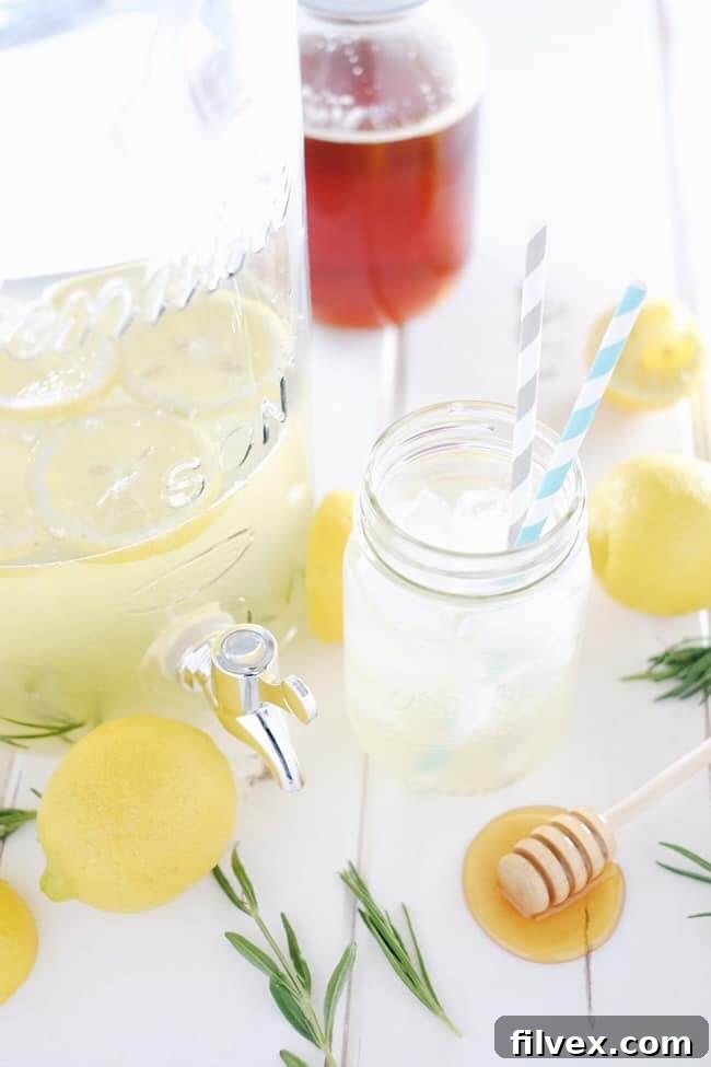 Sipping this homemade honey lavender lemonade out on your patio or porch is the perfect way to spend a summer afternoon or evening. Refined Sugar-Free. | realsimplegood.com