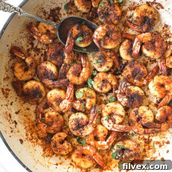 Close-up of a serving of Blackened Shrimp and Veggies.
