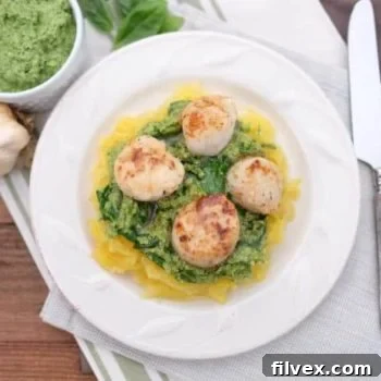 Seared Scallops with Pesto and Spaghetti Squash, garnished